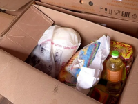 В Шымкенте жильцам карантинного дома привезли продукты